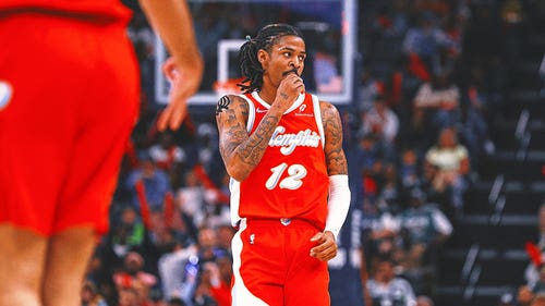 Imagen popular de la NBA: Ja Morant intercambia en la mano, que mantiene la celebración a 'un problema'